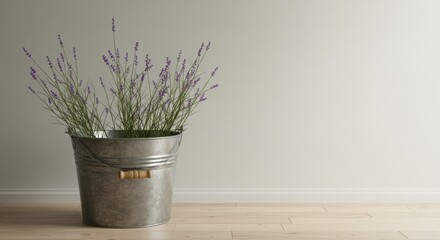 Rustic lavender display in a metal bucket against a minimalist wall