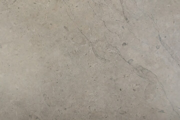 Beżowe, abstrakcyjne tło do projektu, tapeta, beżowy marmur, tekstura grunge, szorstki wzór, naturalny kamień, puste miejsce na tekst	