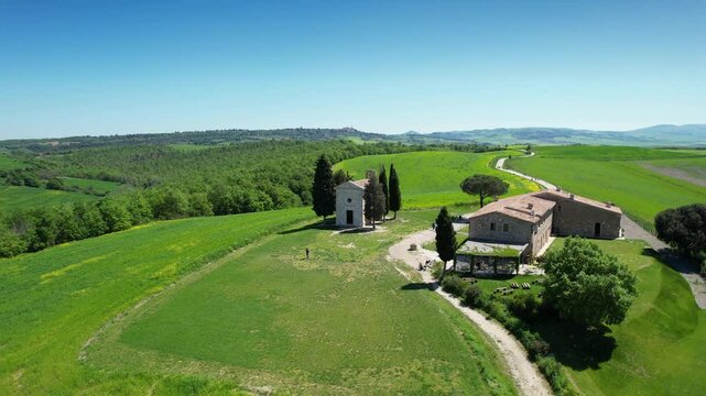 Vitaleta Chapel aerial view in the wonderful valley of D'orcia in Tuscany. Drone footage.