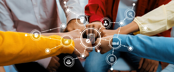 Startup company employee team stacking hand together symbolize successful group of business...