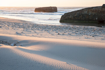 bunkers in denmark from world war II in the evening light