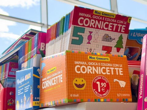 Colorful children's activity books displayed on store shelf