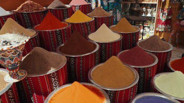Different spices at display in shops of spices market Dubai UAE