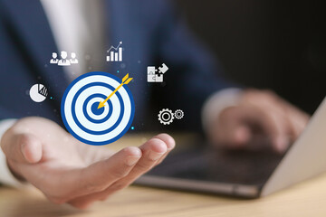 Business development concept. Strategy to win business success, growing to achieve target, strategic growth, challenge, mission, management and planning. Businessman show target icon.