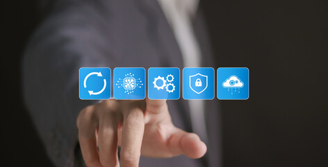 Software update or operating system concept, upgrades to keep your device up to date with enhanced functionality in new versions. Businessman touching update icons on virtual screen.