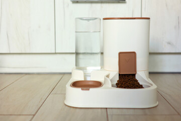 A welldesigned Pet Feeding Station that includes both Water and Food Dispenser for your pets