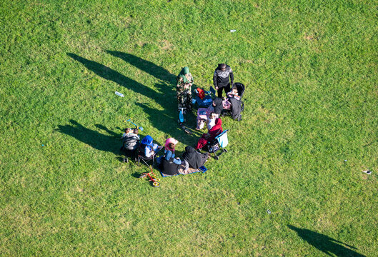 The Josaphat park with multi cultutal groups of families in the green recreation zone in  Schaerbeek, Brussels Capital Region, Belgium