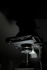 A microscope in a laboratory used for detailed scientific analysis.