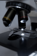 A microscope in a laboratory used for detailed scientific analysis.