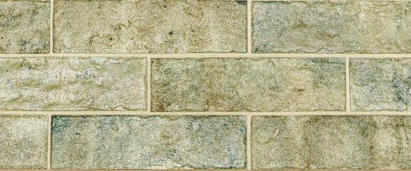 The decorative wall tiles of various textures, shapes and colors