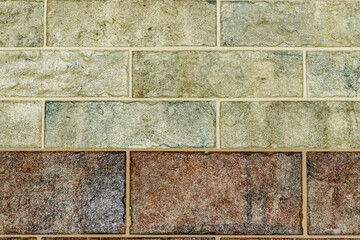 The decorative wall tiles of various textures, shapes and colors