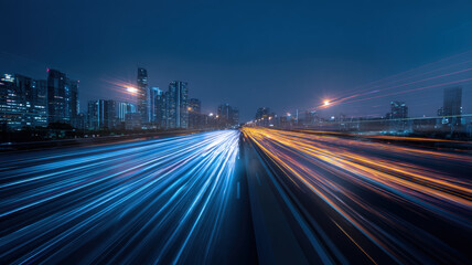 Long exposure night city highway with car light trails and illuminated modern buildings in background