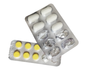 An elevated, slightly angled view of two overlapping pharmaceutical blister packs. One pack contains white, oval-shaped pills with several empty compartments, while the other holds bright yellow, roun