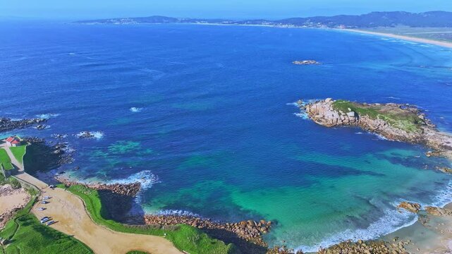 Aerial view of La Lanzada with Sanxenxo hermitage and beach of Pontevedra