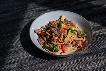 Pasta with beef, mushrooms and vegetables. 