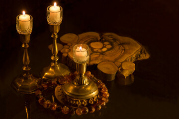Candles burn romantically in the night
