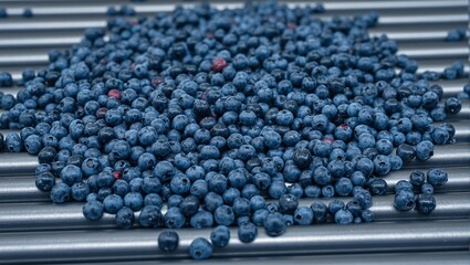 Fototapeta premium Fresh blueberries in motion on industrial conveyor belt vibrant colors and dynamic movement perfect for food industry concepts