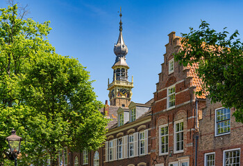 Stepped gable houses and the bell tower of the town hall (Stadthuis) of Veere, province Zeeland, The Netherlands