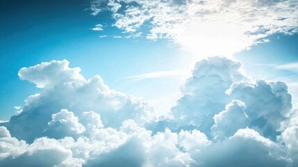 Naklejka premium Majestic Cloudscape with Sunlight Peeking Through the Blue Sky