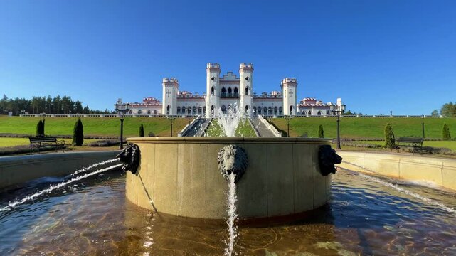 Belarus, Puslovsky Palace, September 5, 2024: Kossovsky Autumn Castle. An old historical castle in Kosovki in sunny autumn weather. An architectural monument in the style of English Neo-Gothic. 4K