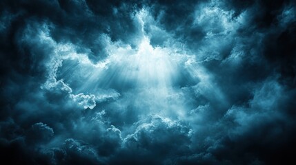 Obraz premium Dark and Dramatic Clouds with Rays of Light Breaking Through Sky
