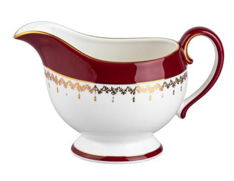 A classic porcelain sauce boat with a white body, dark red trim, and a gold pattern on the rim, set against isolated on a transparent background