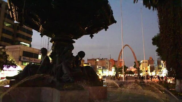 peru tacna city air viux cathedral and monument at sunset  wather fountain arc  monument at sunset 