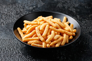 Prawn cracker sticks, fingers. Shrimp crispy snack in a bowl