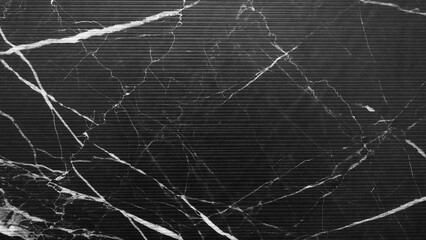 A black and white photo of a stone wall with a lot of cracks and lines. photo has a moody and somewhat eerie feel to it abstract texture background for template pages and banners