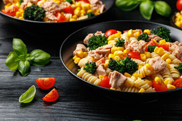 Tuna corn pasta salad with tomatoes and broccoli