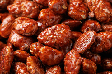 Caramelized almonds. Toasted almonds coated with caramel syrup.