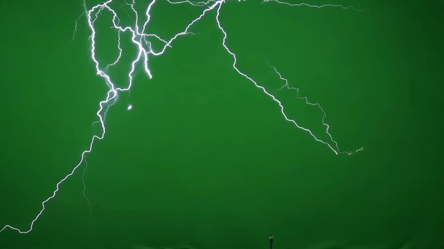 Electric Lightning Strikes Flashing Across Bright Green Chroma Key Background For Storm VFX And Editing