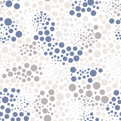 Vector seamless pastel pattern. Tileable texture with scattered circles. Abstract childish background.