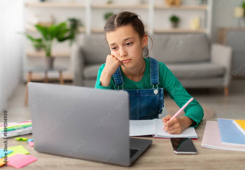 Poster children education. bored student tired of learning doing homework using pc looking at laptop screen