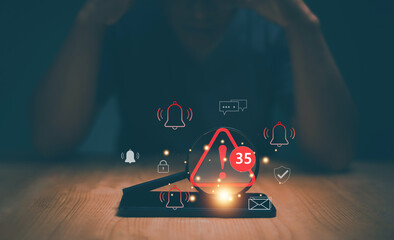 Cyber security, Magnifying glass with caution warning sign and number of notification error maintenance and virus detected on smartphone, Ransomware, Hacker attacks. Detection dangerous worms.