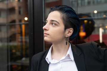 Portrait of young businesswoman in suit