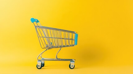 Shopping cart against a bright yellow background