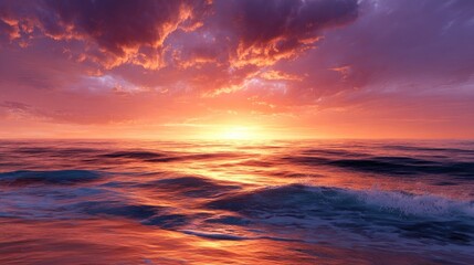 Stunning sunrise over a vast ocean expanse.