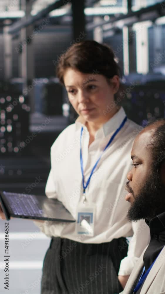 Poster vertical video happy data center manager providing positive feedback to engineer developing neural n