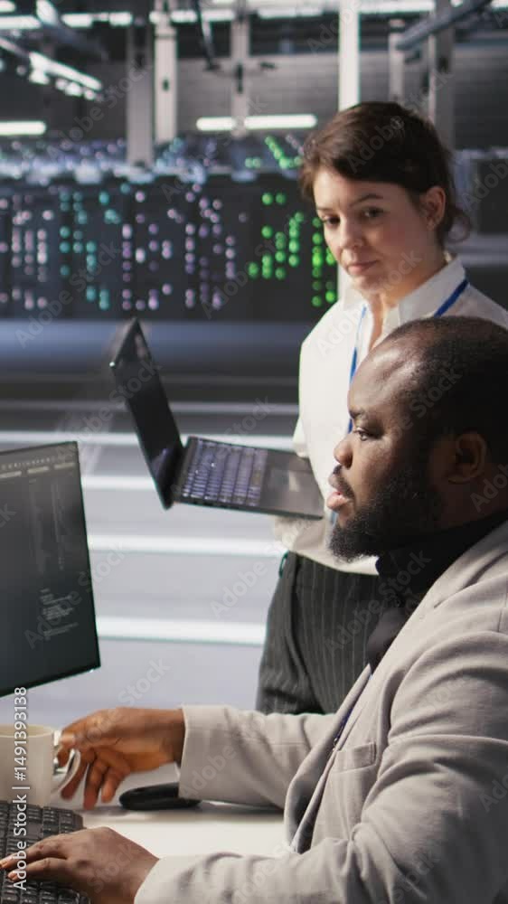 Poster vertical video happy data center manager providing positive feedback to engineer developing neural n
