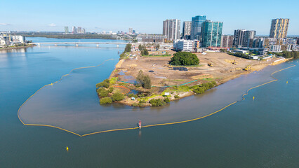 The Sydney suburb of Wentworth point  with barriers on the Parramatta river to prevent pollution during construction.