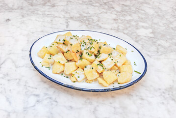 The exact origin of patatas bravas is unknown
