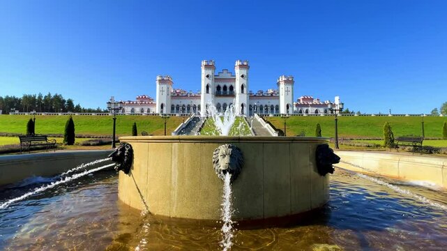 The Puslovsky Palace in Belarus. The Kossovsky Autumn Castle. An old historical castle in Kosovki in sunny weather in autumn. An architectural monument in the style of English Neo-Gothic. 4K