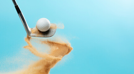 Golf ball explode from Tee off. Golfer hit ball with metal iron club to sand explosion on green. Golf club hit ball on green tee off with sand flying scatter. Blue Sky background isolated
