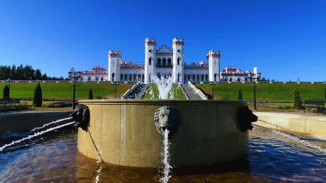 Belarus, Puslovsky Palace, September 5, 2024: Kossovsky Autumn Castle. An old historical castle in Kosovki in sunny autumn weather. An architectural monument in the style of English Neo-Gothic. 4K