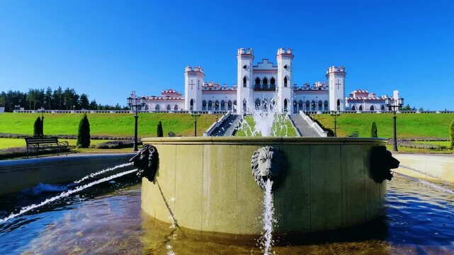 Belarus, Puslovsky Palace, September 5, 2024: Kossovsky Autumn Castle. An old historical castle in Kosovki in sunny autumn weather. An architectural monument in the style of English Neo-Gothic. 4K
