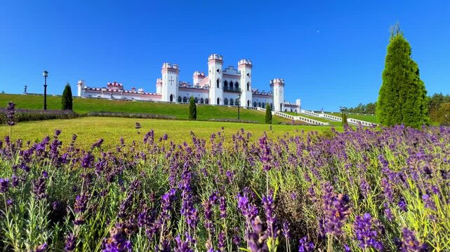 The Puslovsky Palace in Belarus. The Kossovsky Autumn Castle. An old historical castle in Kosovki in sunny weather in autumn. An architectural monument in the style of English Neo-Gothic. 4K