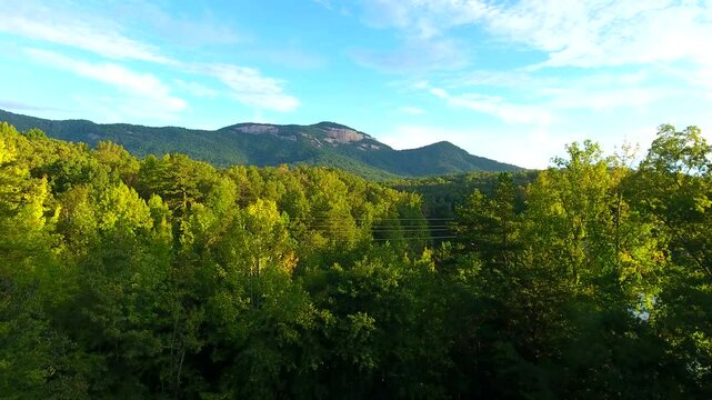 Aerial flying at sunrise Table Rock State park in South Carolina 