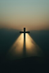 Naklejka premium A cross is lit up by the sun, creating a beautiful and serene atmosphere