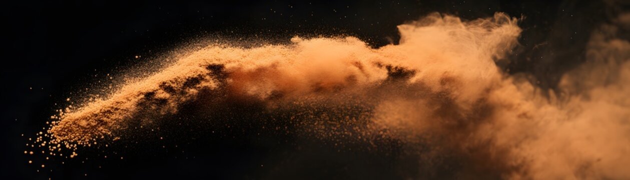 A dynamic display of airborne particles against a dark background.
